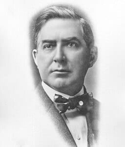 FranklinCarson Portrait of a distinguished man in 19th-century attire, historical museum exhibit showcasing early American history.