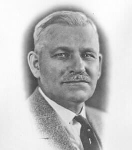 GeorgeFreyermuth Vintage black and white portrait of a distinguished man, historical figure, at The History Museum.