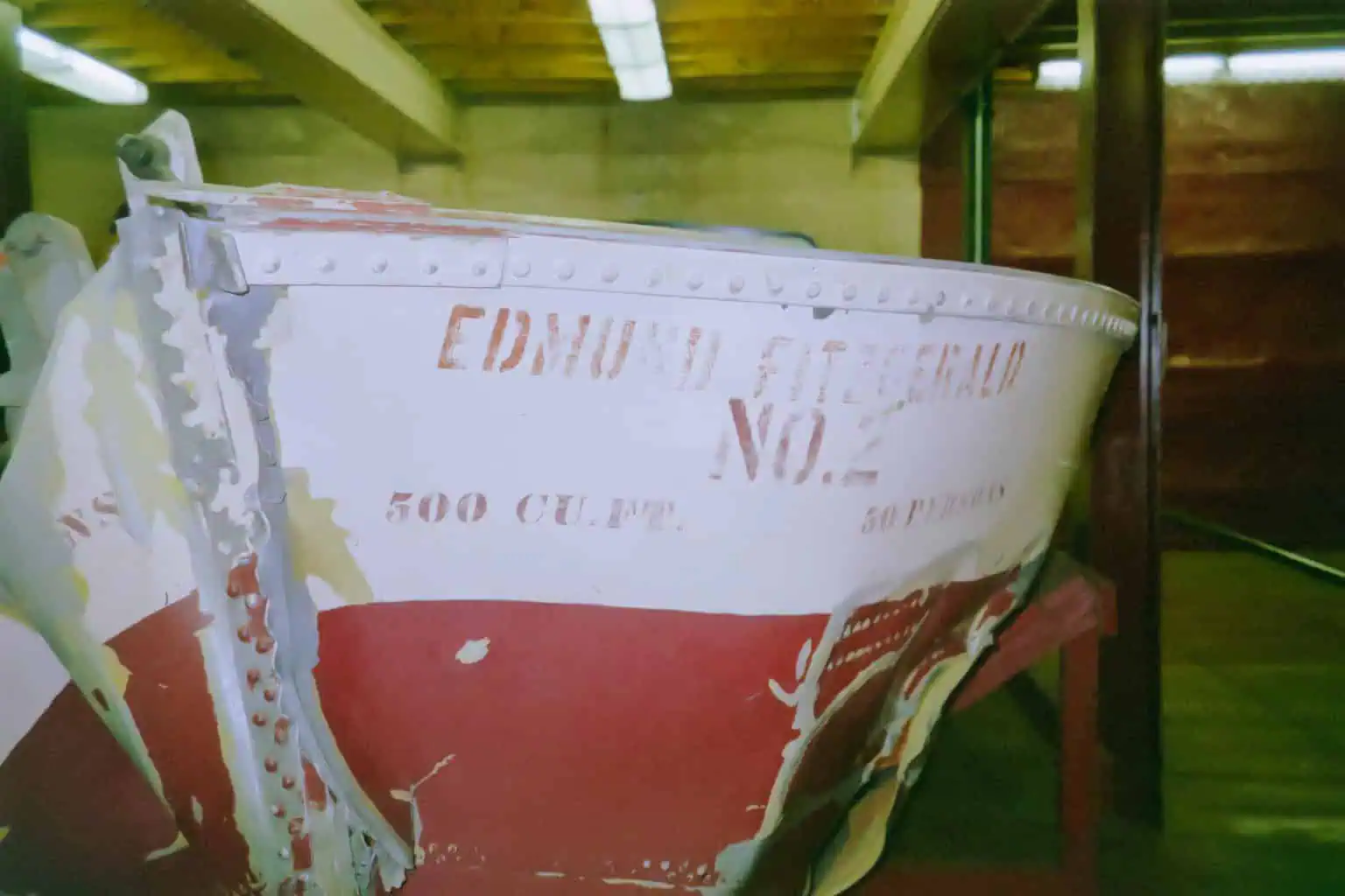 Old vintage life preserver with faded signage at The History Museum, showcasing maritime history artifacts.