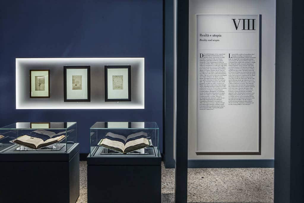 Exhibition display of Leonardo da Vinci's sketches and writings at a museum.
