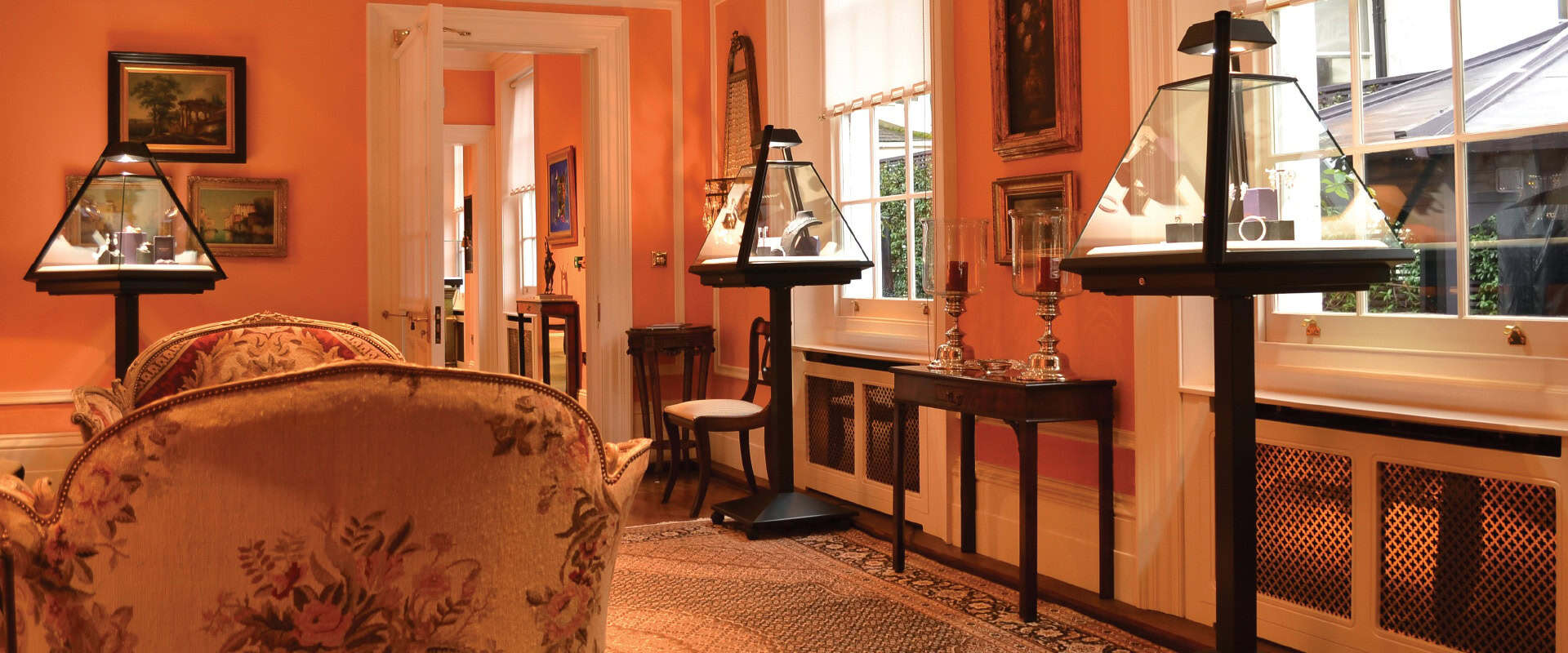Elegant interior with vintage furniture and large windows in Belgravia, London.