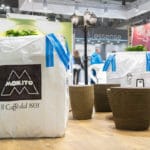 Large Decorative Planters With Blue Ribbons At Stand Mokito - Host 2017.