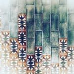 Decorative Ceramic Wall Tiles With Geometric Patterns And Vibrant Colors.