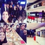 Group Of People At Architects Srl Night Event In A Cinema And Dining Area.