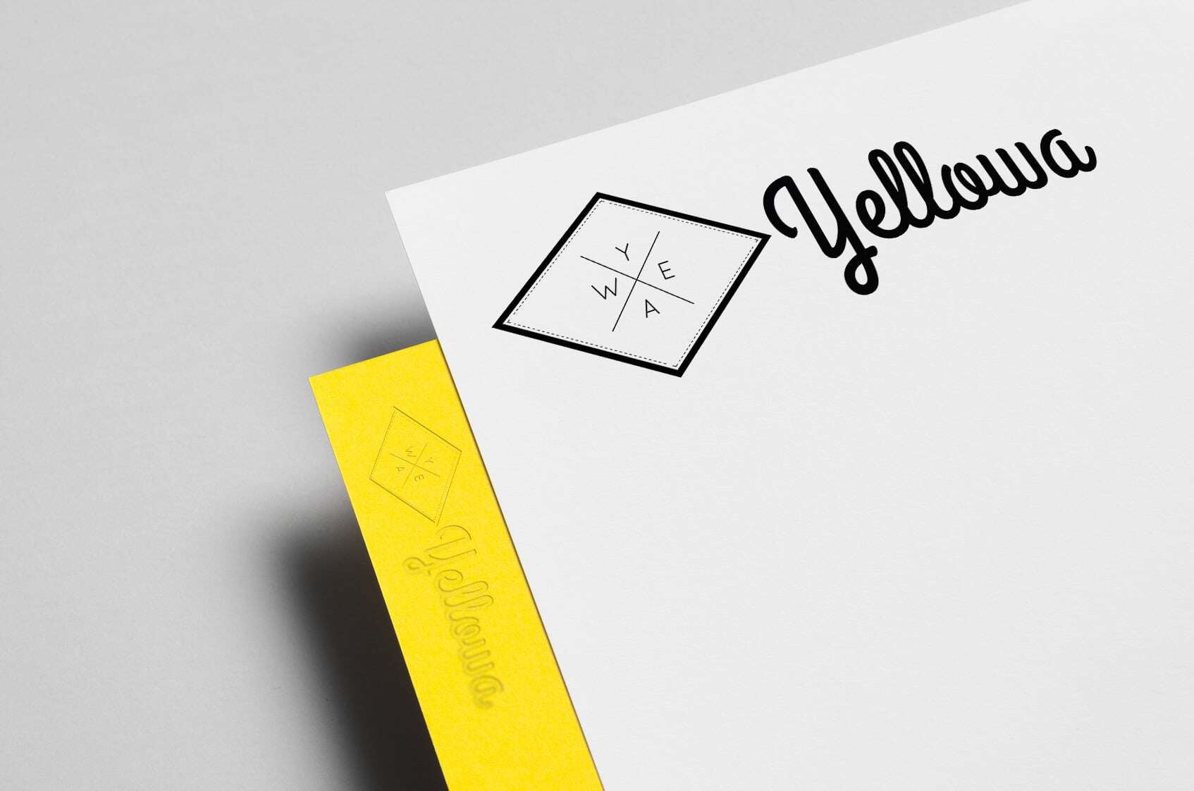 Yellowa Design Brand logo on white paper with yellow edge.