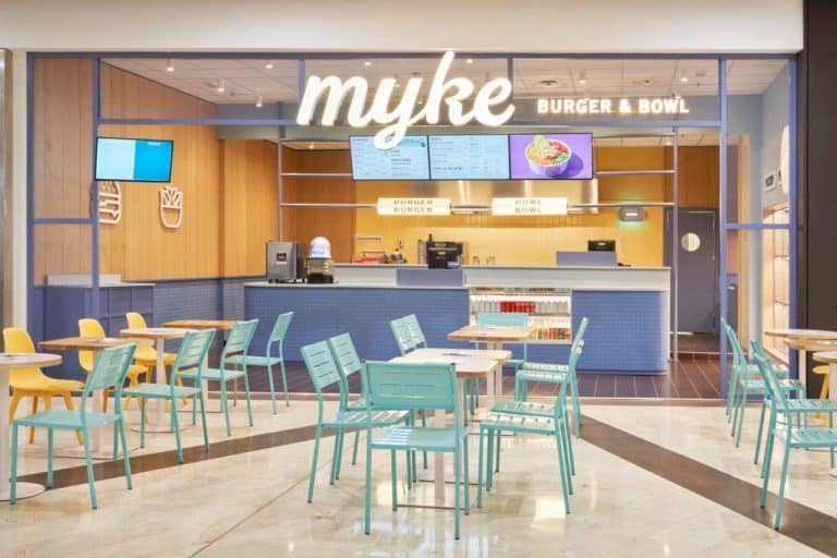 Myke Burger &Amp;Amp; Bowl Restaurant Interior With Seating And Digital Menu Screens.