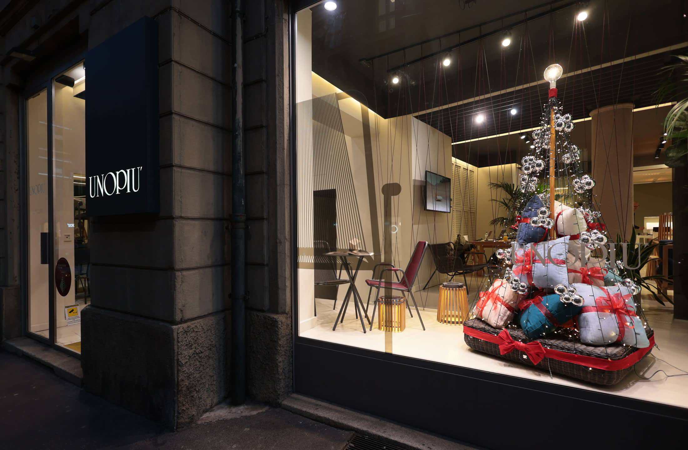 Modern Store Window Display With Christmas Decorations And Gifts.