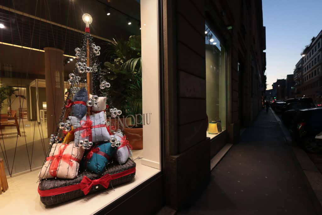 Festive Holiday Window Display With Wrapped Gifts And Christmas Decorations.