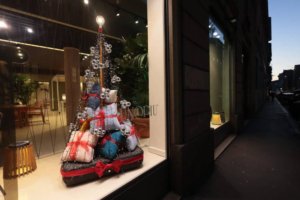 Festive Holiday Window Display With Wrapped Gifts And Christmas Decorations.