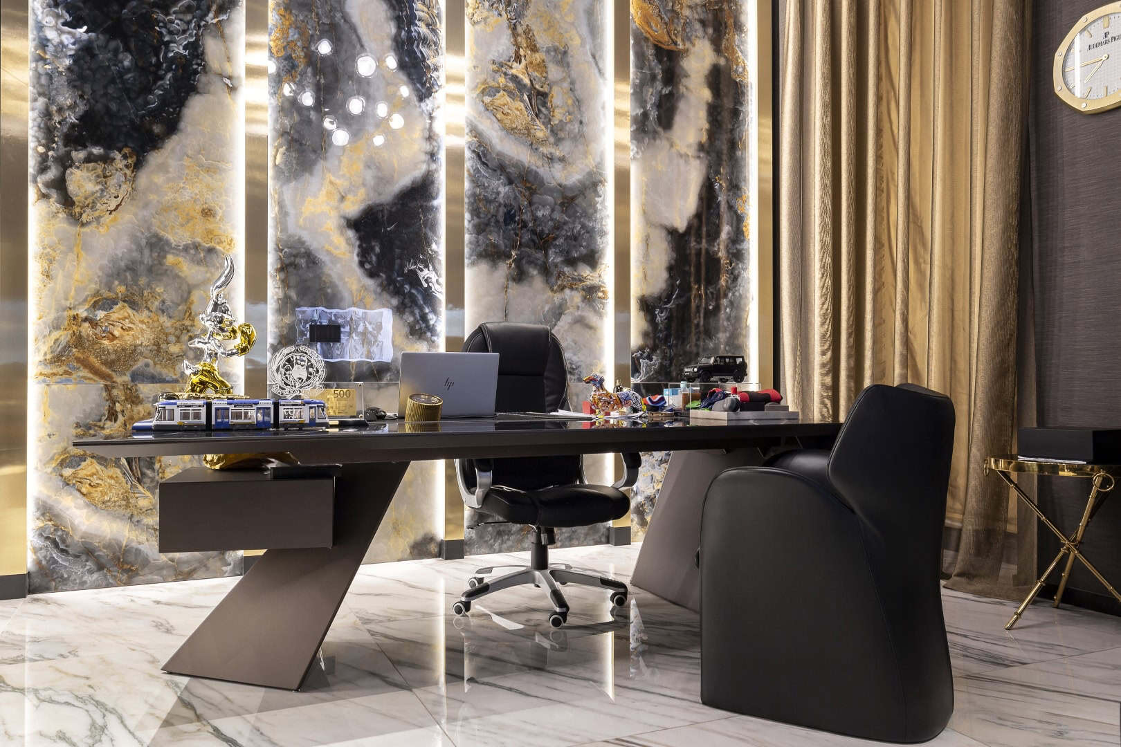 Luxurious modern office with marble walls and elegant decor.