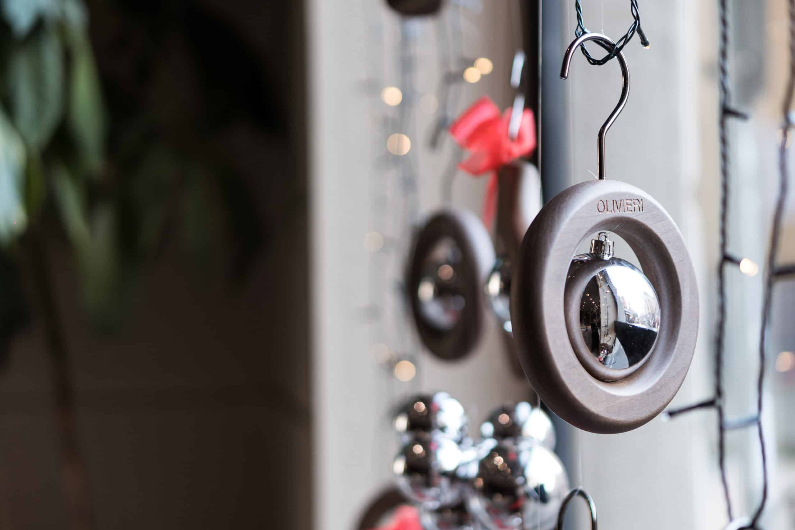 Close-Up Of A Modern Padlock Hanging On A Wire With Blurred Background.