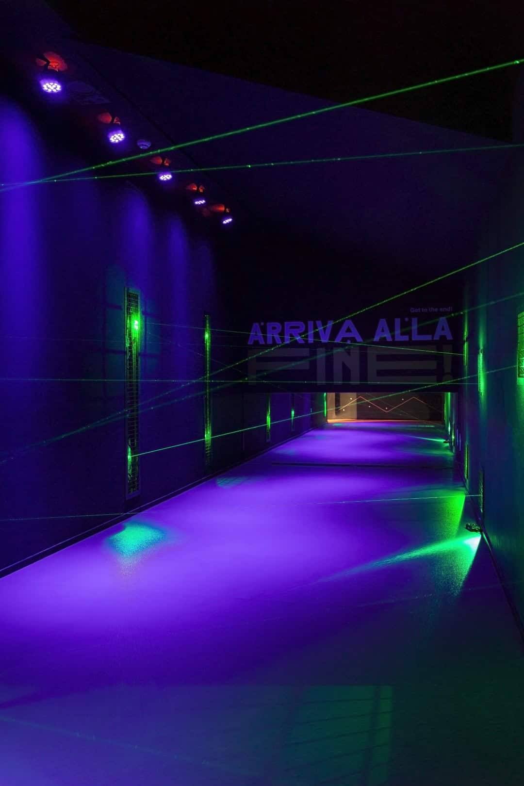 Colorful illuminated corridor with laser lights at Museum of Senses.
