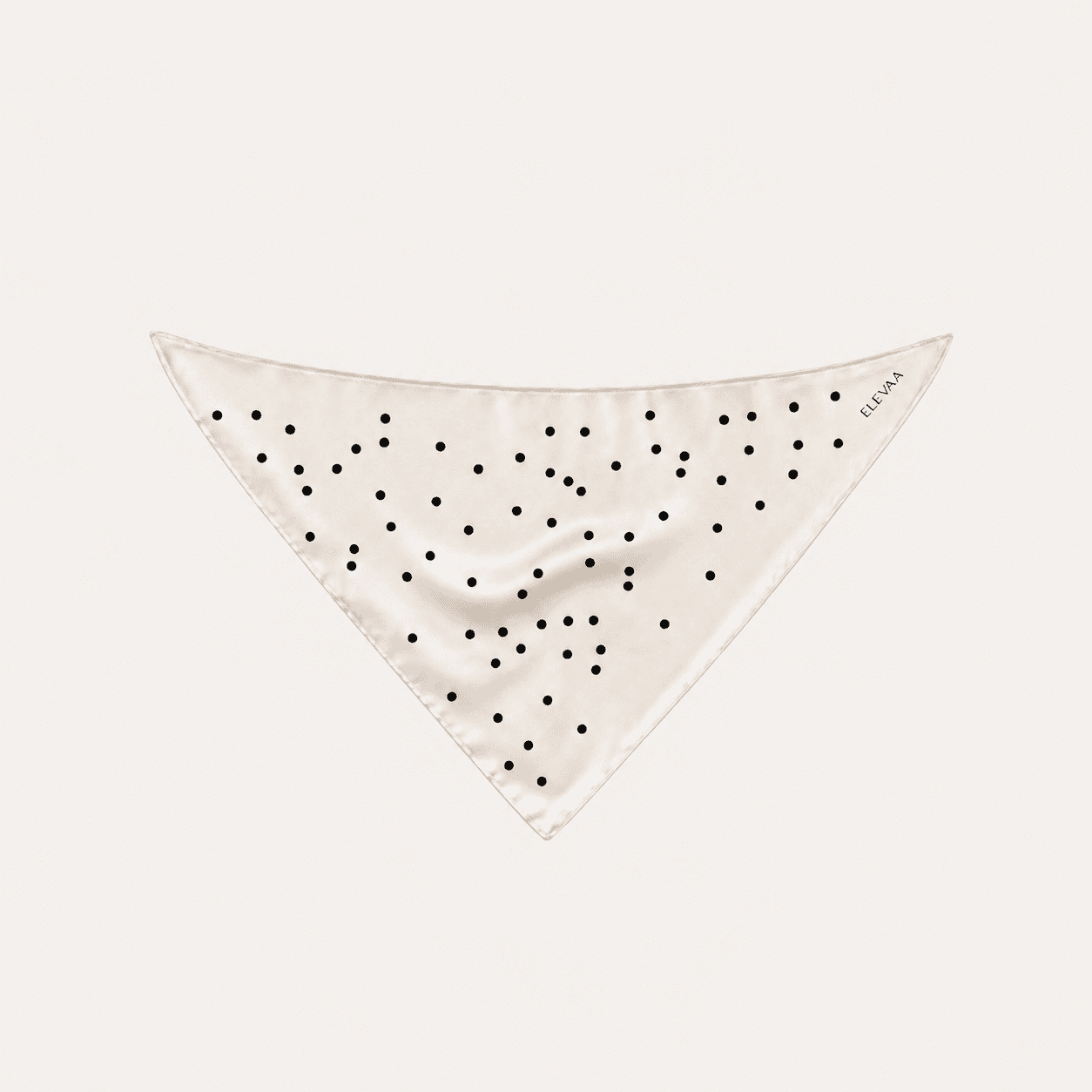 Beige polka-dot bandana scarf laid flat with a small 'ELEVAA' label on the corner.