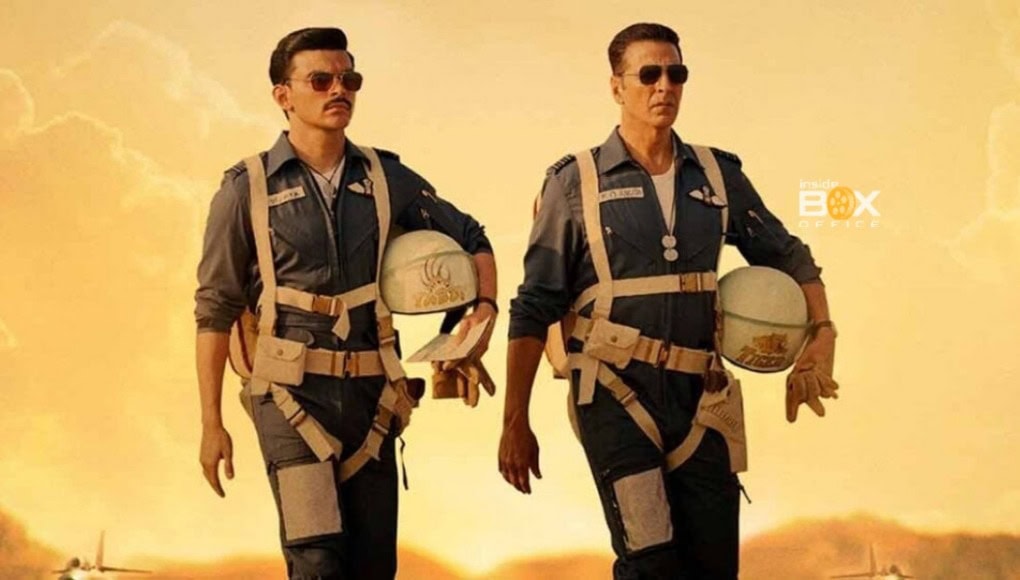 High-Energy Image Of Two Male Pilots In Uniform Walking With Helmets, Set Against A Dramatic Sunset Sky, Representing Themes Of Adventure, Aviation, And Action Movies.