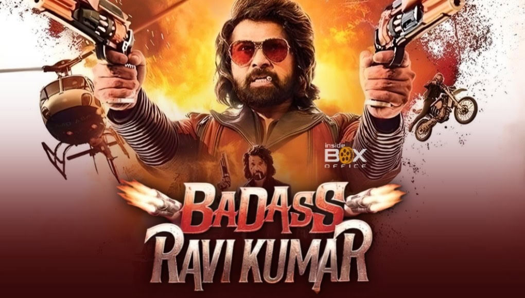 High-energy promotional poster for the Bollywood action film "Badass Ravi Kumar" featuring Ravi Kumar with guns, motorcycles, and explosions, emphasizing action, comedy, and heroism.