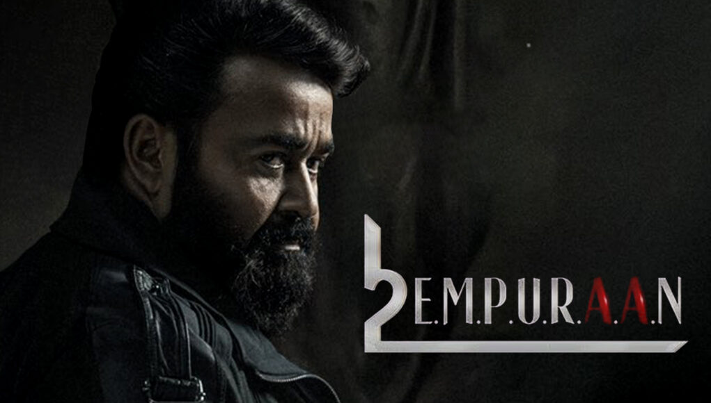 Haider Ali, Indian actor, in a dark leather jacket with serious expression, promoting the movie 2.EMPUR.AAN on Inside Box Office, blending movie promotion with entertainment industry insights.