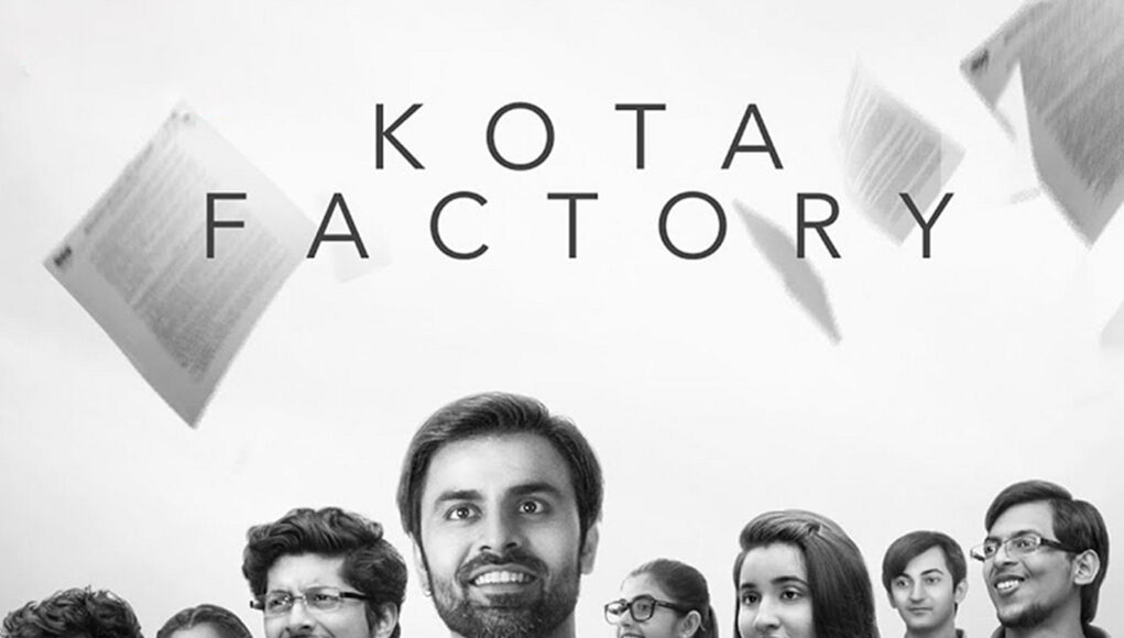Stunning black and white image of diverse young professionals smiling, with "Kota Factory" text above, highlighting themes of teamwork, innovation, and workplace culture for SEO relevance.