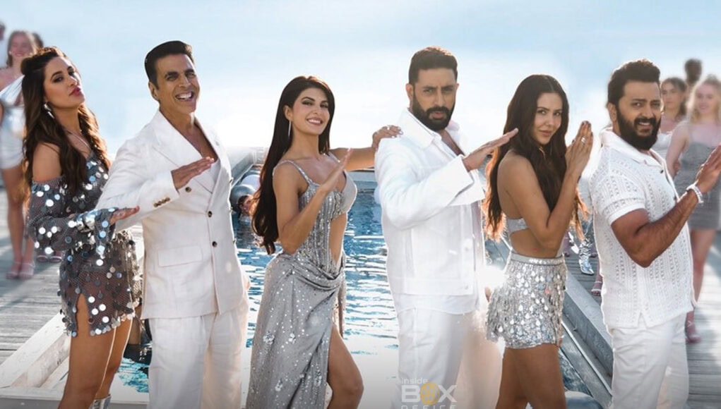 Elegant cast of Housefull 5 celebrating on a yacht with glamorous outfits and joyful expressions, highlighting the comedy, entertainment, and star-studded Bollywood film.