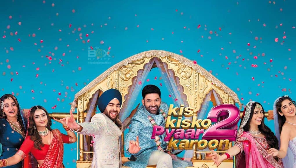 A lively promotional image for the Indian comedy film "Kis Kisko Pyaar Karoon 2," featuring actors in traditional attire with a festive wedding setting, colorful background, and cheerful expressions.
