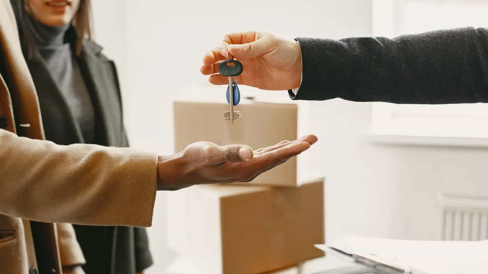 Person receiving keys to a new Las Vegas rental home representing a fresh start