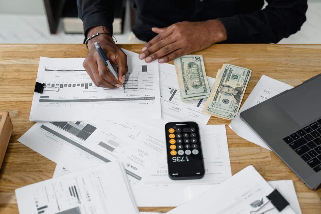 Owner statement and trust accounting documents on a Las Vegas property manager desk