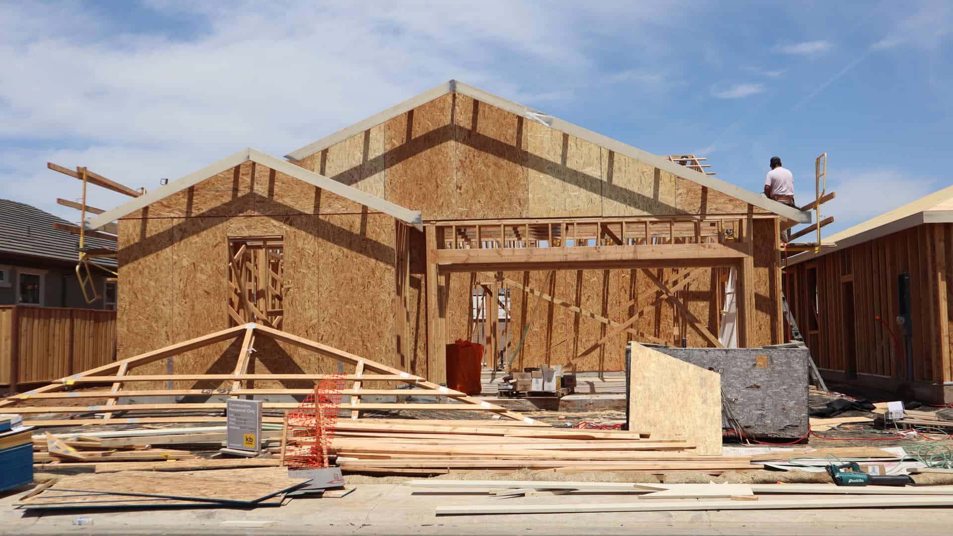 New construction homes beside older resale houses in a Las Vegas valley neighborhood