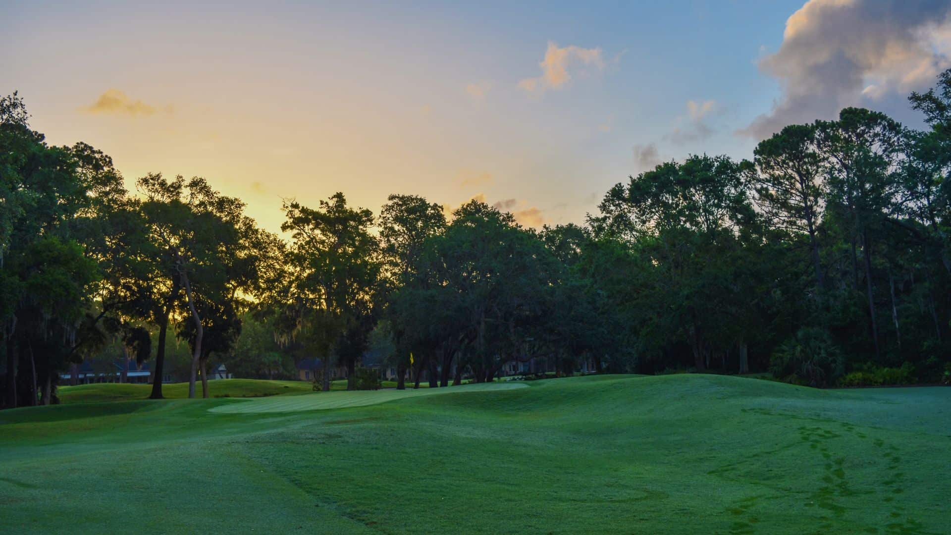 Homes lining a golf course fairway in a guard-gated Las Vegas community similar to Rhodes Ranch