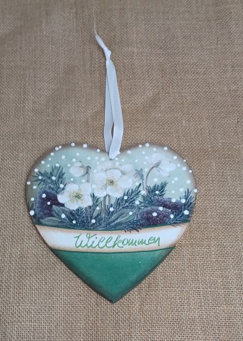 Dekorativer Holzanhänger mit weihnachtlichem Design und "Willkommen"-Gravur, handgefertigt aus Holz.