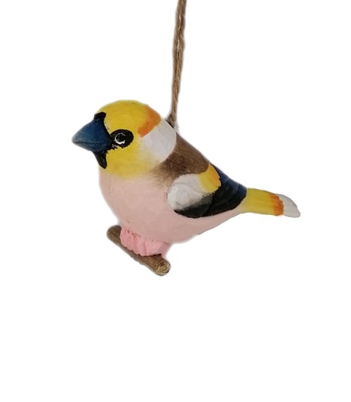 Handgefertigtes Holzvogel mit bunter Farbgestaltung als Holzdekoration.