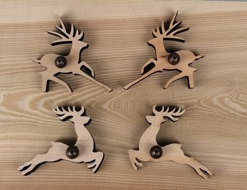 Holzdeko mit Hirschmotiv, handgefertigt, naturbelassen aus Ischler Holzhandwerk.