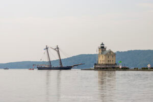 The 19th century schooner replica known as Amistad approaching the Rondout Lighthouse as it enters Rondout Creek.