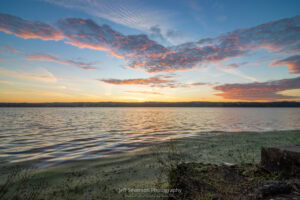 Dawn breaking over the Hudson River during high tide from along the shore of Esopus Meadows Point in Ulster Park.