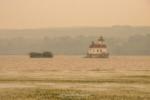 Smoke from the Canadian wildfires creating a hazy, yellow afternoon at the Esopus Meadows Lighthouse on the Hudson River.