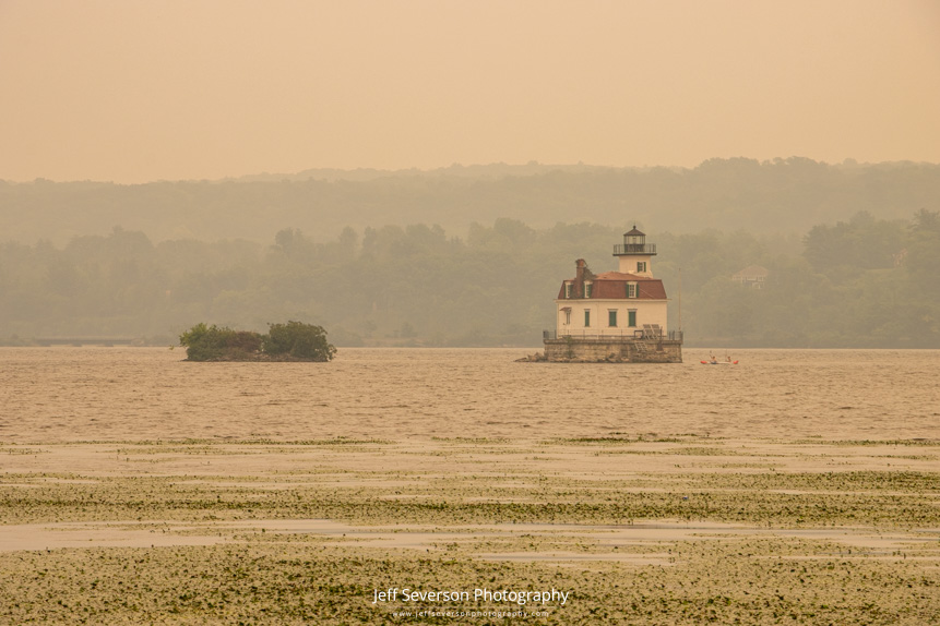 Smoke from the Canadian wildfires creating a hazy, yellow afternoon at the Esopus Meadows Lighthouse on the Hudson River.