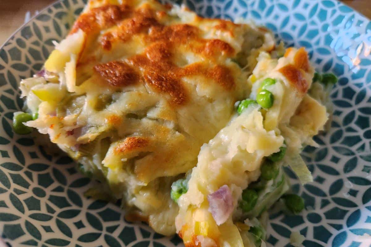 homity pie in a blue patterned bowl