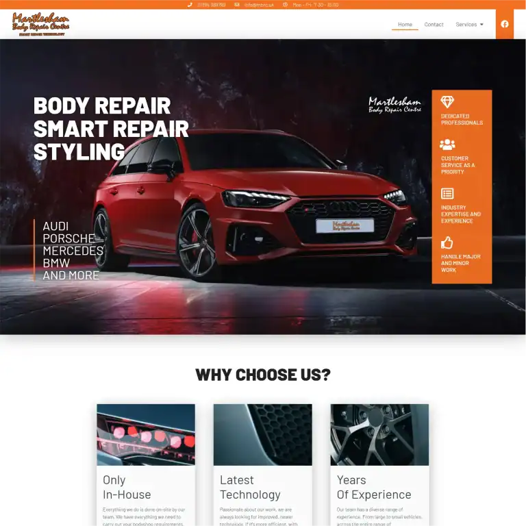 Red car in workshop for body repair, styling, and paintwork by Liteform.