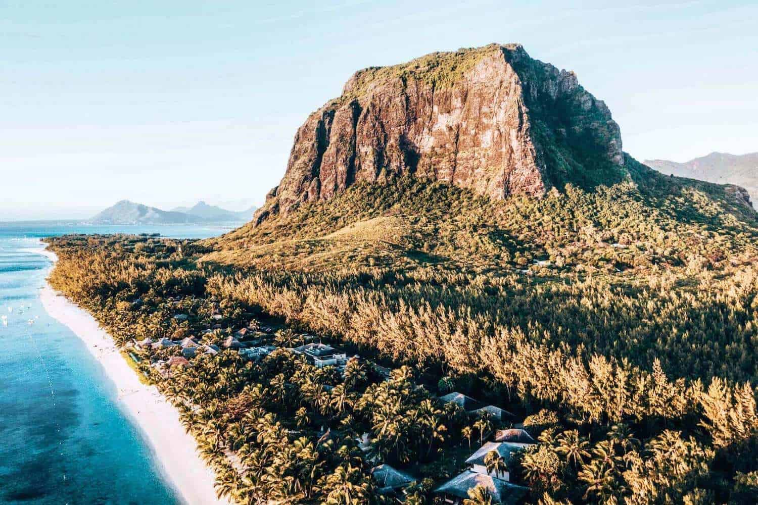 A view along the coast of Mauritius framed by a mountain