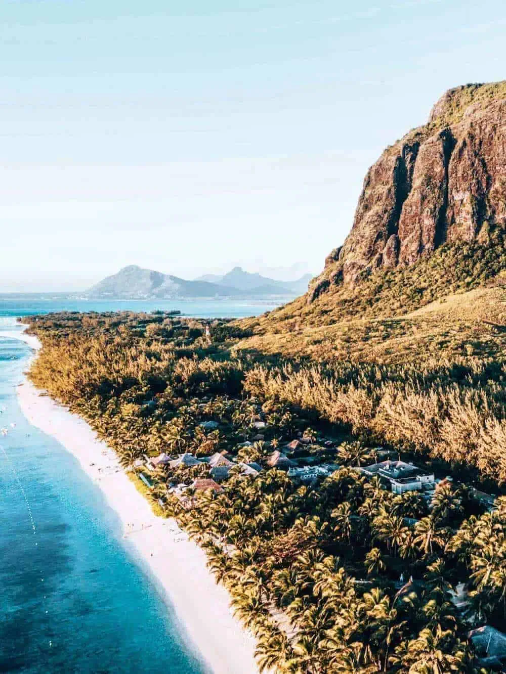 A view along the coast of Mauritius framed by a mountain