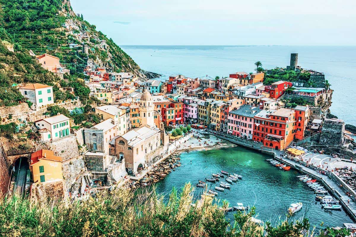 A colourful town built into the cliffs alongside the sea