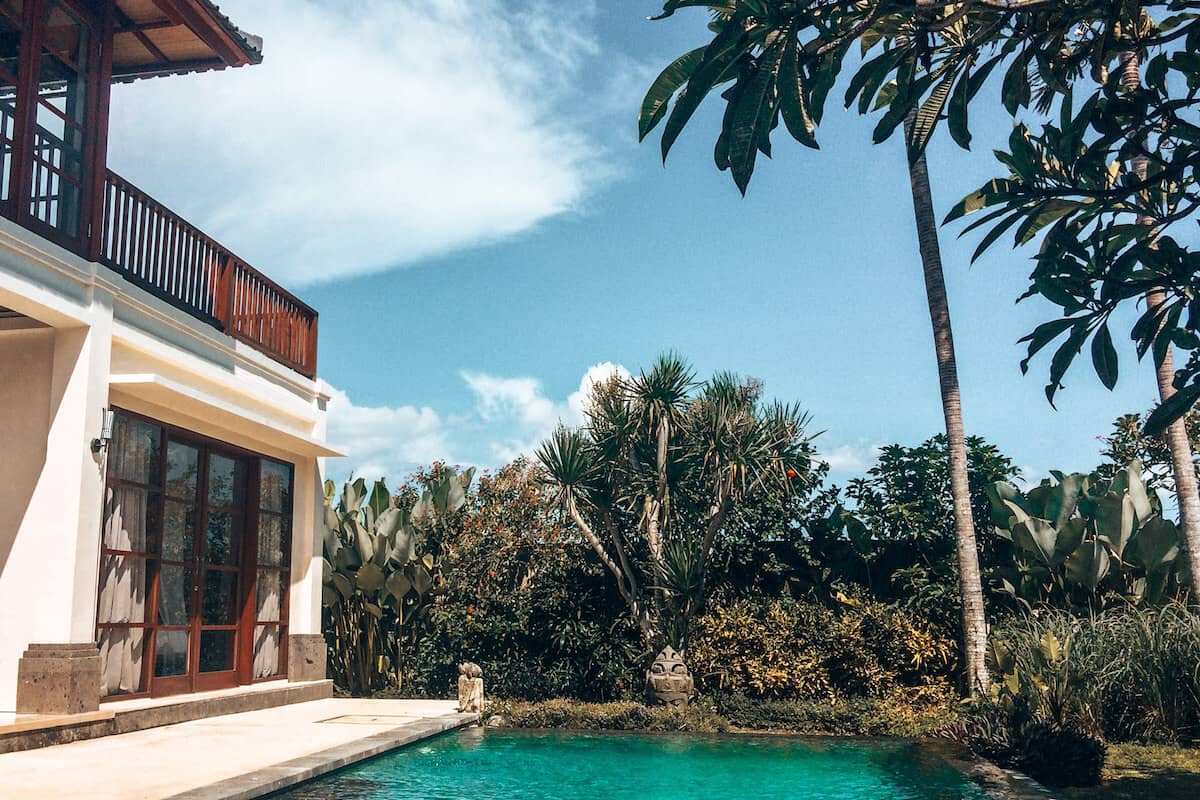 A traditional Balinese villa with a private pool
