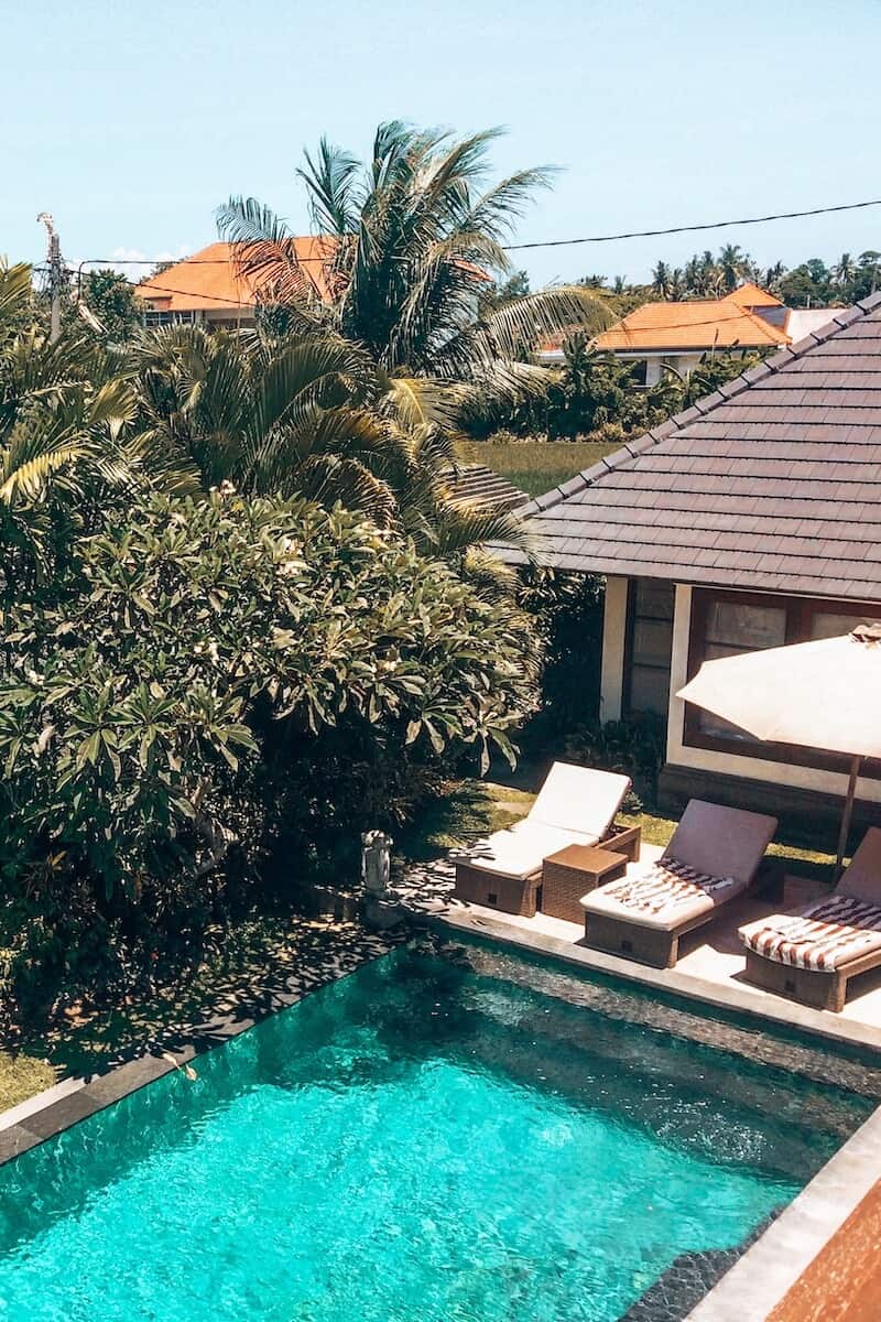 A private pool with loungers at a villa in Bali