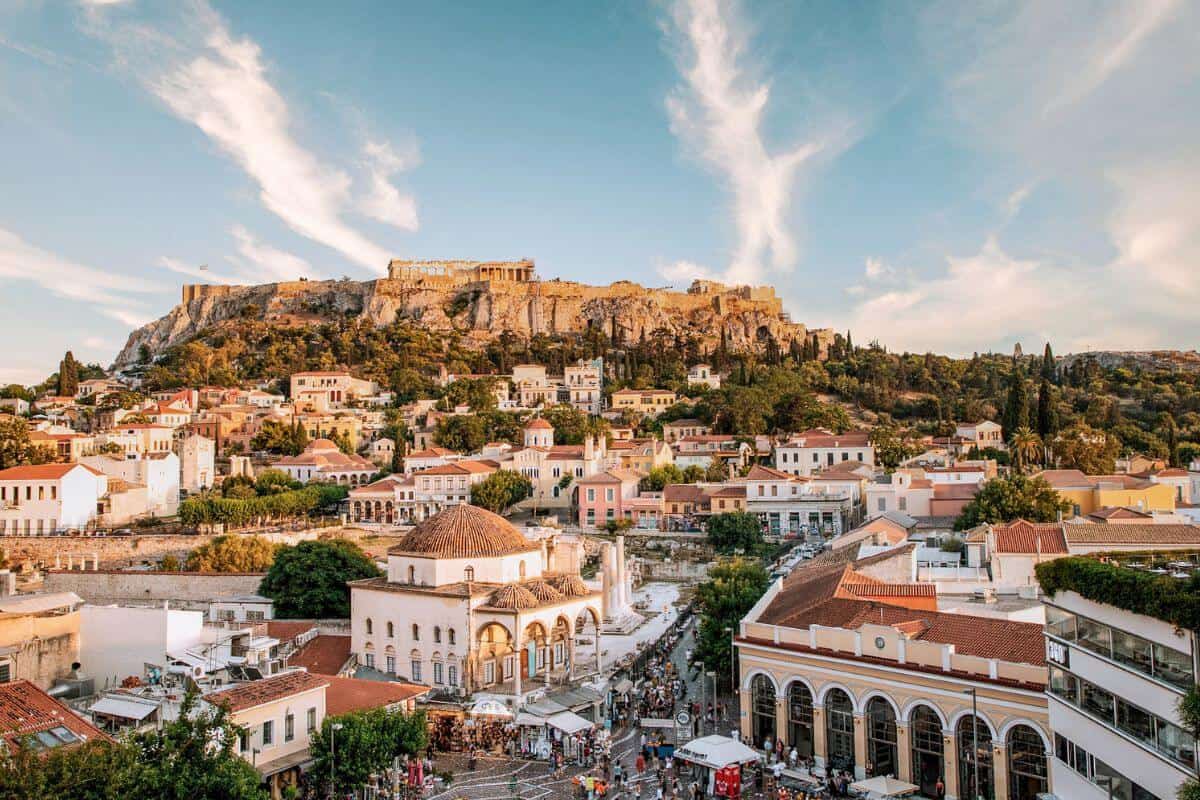 Panoramic view of Monastiraki square and the Acropolis at sunset in Athens Greece