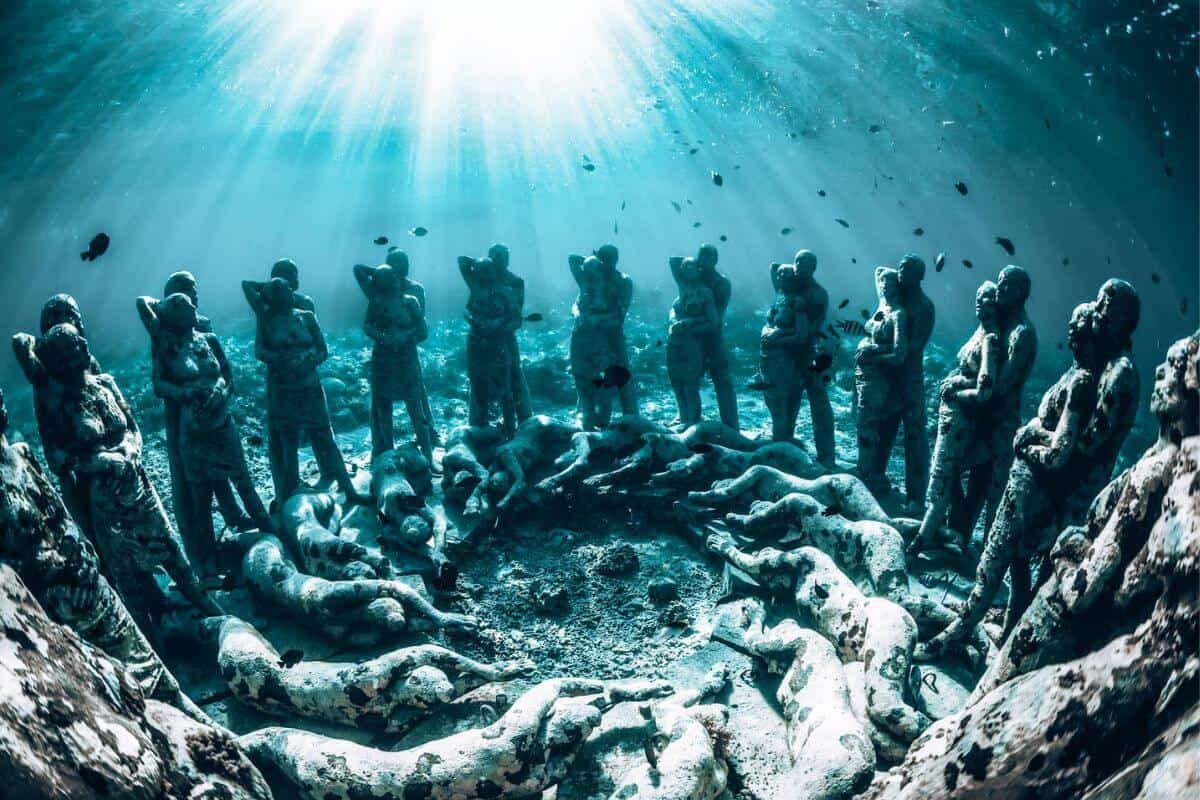 Underwater sculptures of people in the Gili Islands