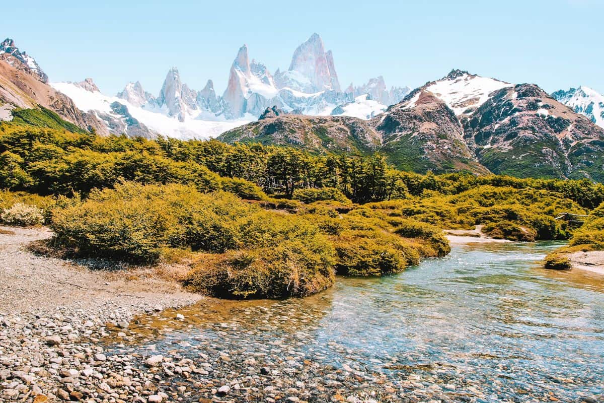 A view towards rugged and dramatic, snow-capped mountains in a national park in Patagonia