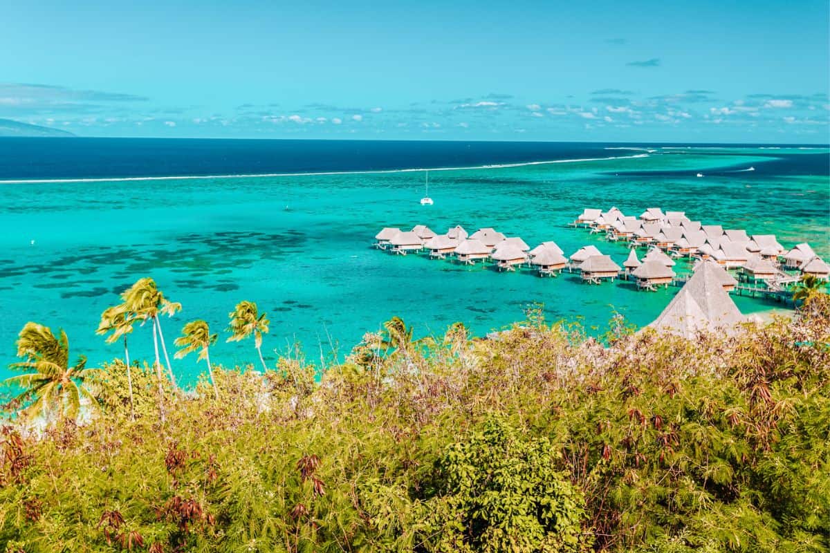 Turquoise tropical seas with overwater bungalows in French Polynesia