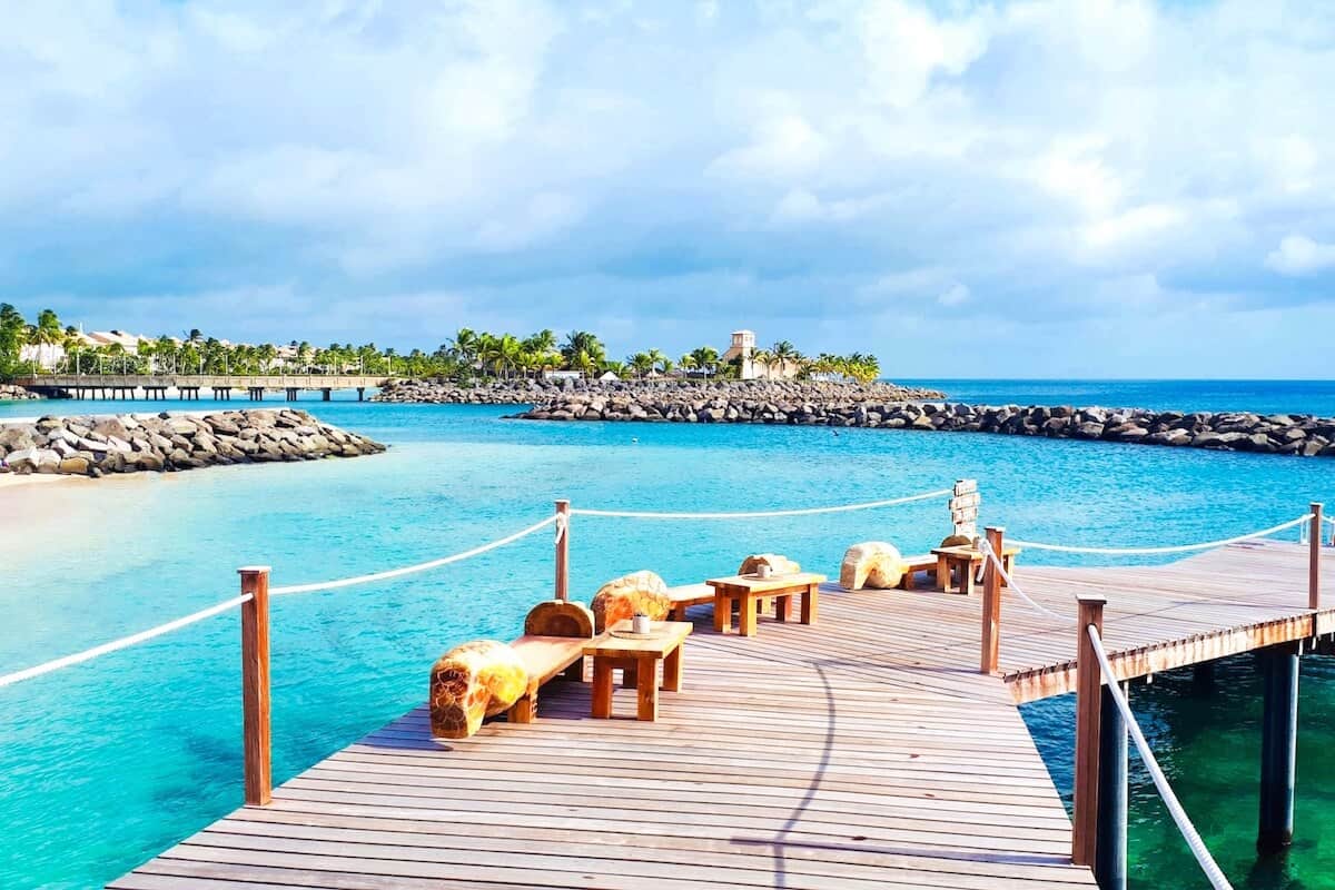 A boardwalk over the sea at a beach club in Barbados
