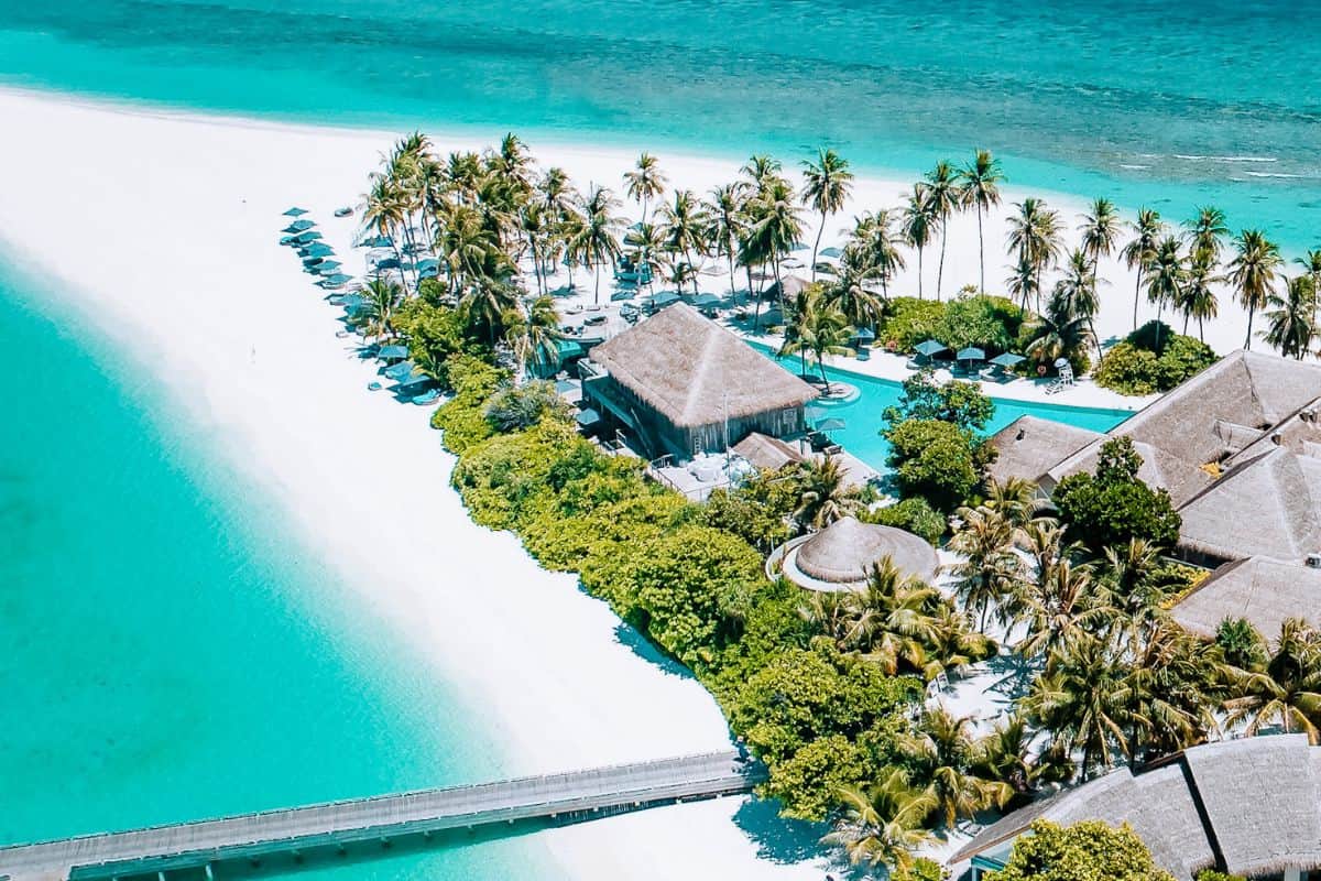 An aerial view of a luxury island resort in the Maldives