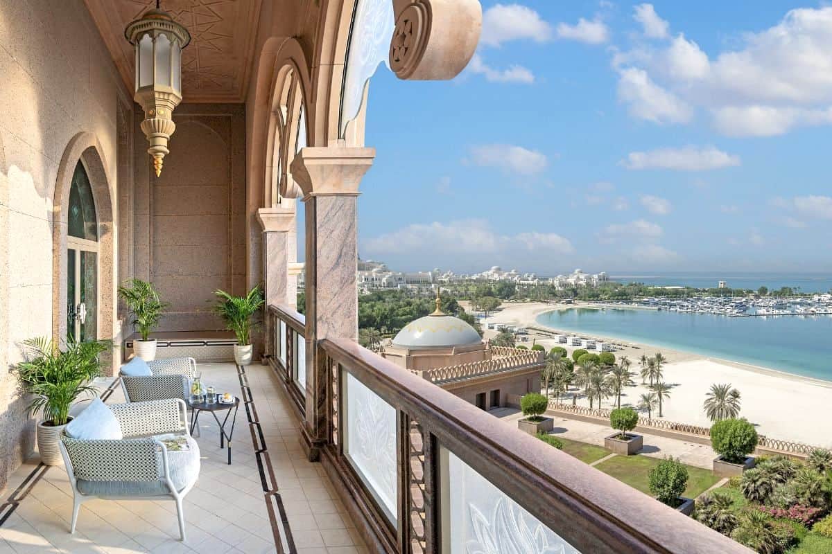 A grand hotel balcony at Emirates Palace in Abu Dhabi overlooking the beach