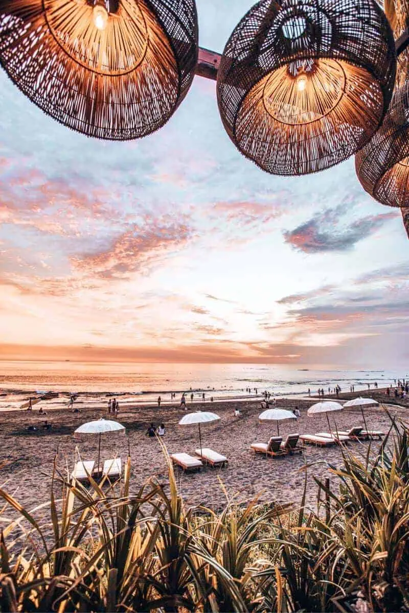 A sunset over the beach in Canggu, Bali