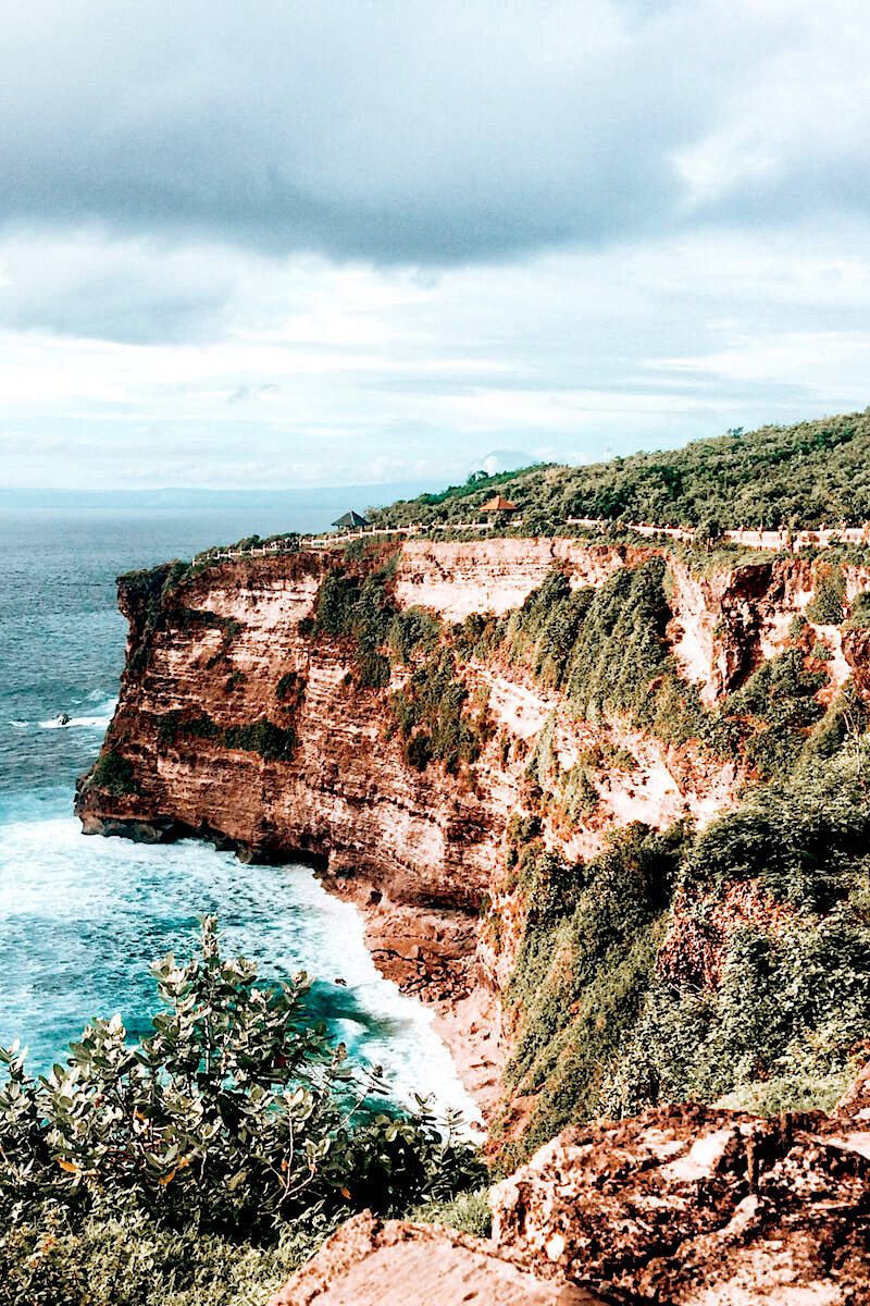 A rugged coastal cliff in Uluwatu, Bali
